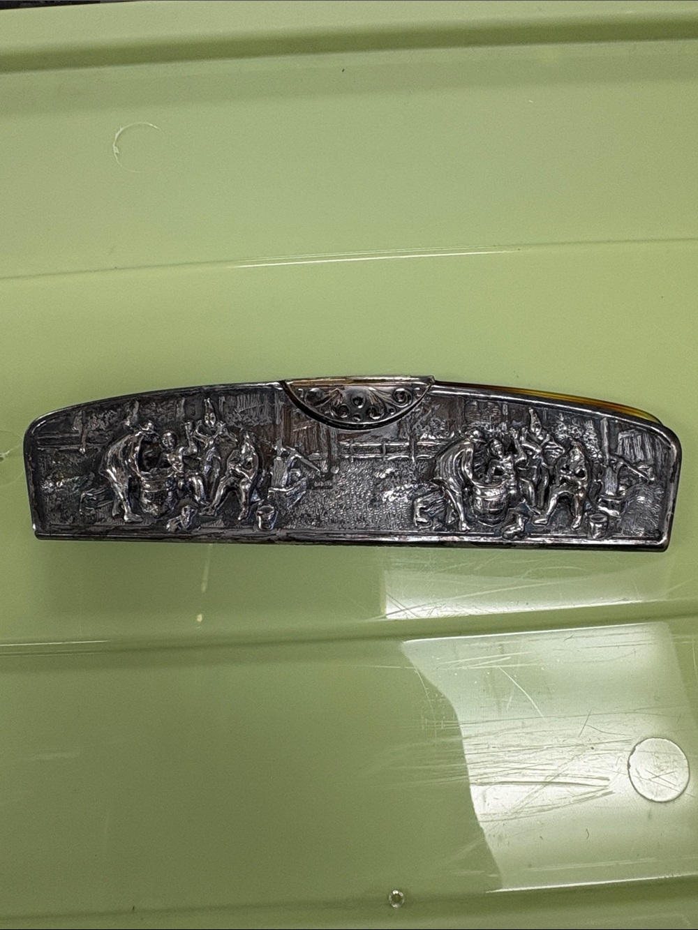 Vintage Embossed Silver comb with Scene Detailing